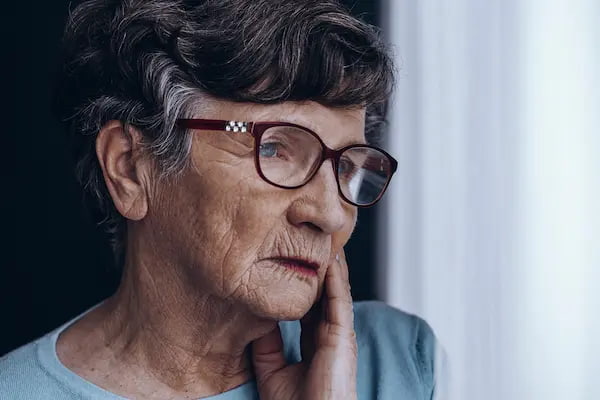 elderly-woman-s-face-with-glasses