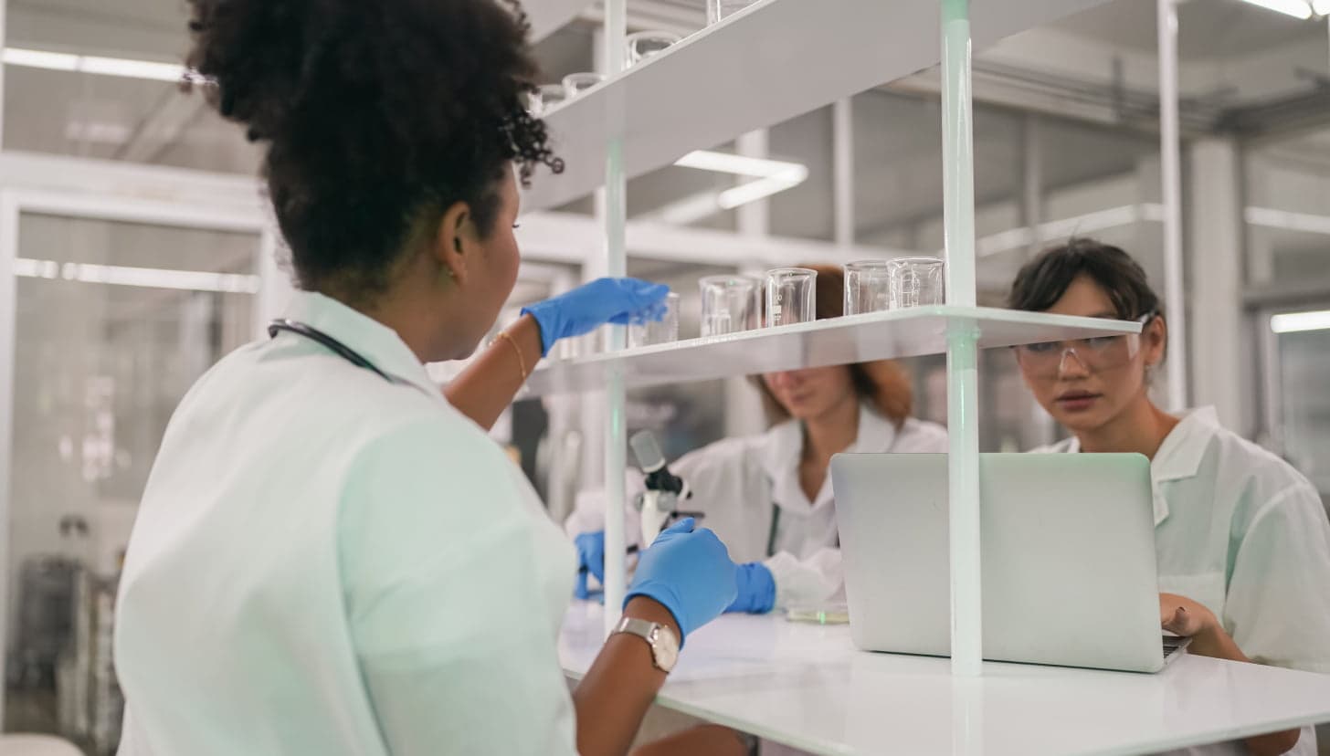 young-scientist-in-white-lab